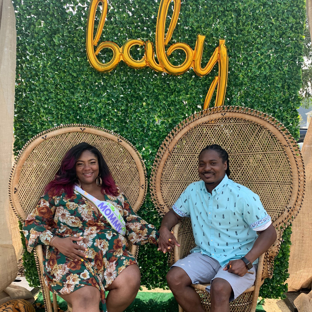 Loren Newman and her partner reggie at their baby shower